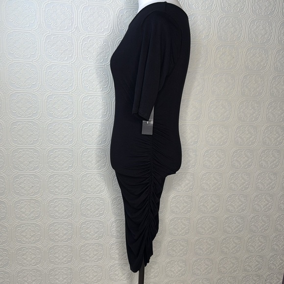 Steal Your Attention Black Bodycon Dress, Size M NWT
Lulus - Picture 8 of 14